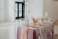 06 a glam party chandelier of pink pampas grass, blooms and disco balls for decorating your wedding reception space