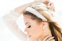 10 a stylish headband of pearls and crystals to complete a modern or casual bridal look is a great solution