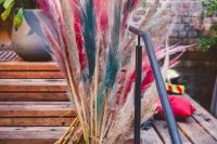 11 Bright pampas grass decorated the lounge and made it fun and playful