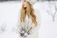 24 a fur hat and a white long creamy coat will keep you warm and comfortable even outside