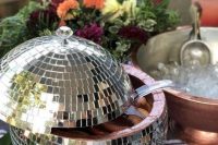 25 a disco ball punch bowl with a lid is a very creative and bold piece to rock at any party or any wedding
