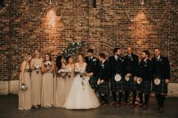 Groomsmen chose traditional kilts, tweed blazers, vests and brown shoes