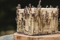 The wedding cake with a lemon and lavender was a simple but so beautiful