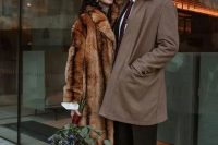 a brown midi faux fur coat is a lovely addition to the bridal look, and it will keep her warm anytime