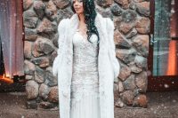 a long white faux fur bridal coat is a beautiful and cool winter cover up, looks chic and nice