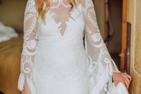02 The bride was wearing a boho lace wedding dress with bell sleeves and rocked braided hair