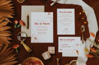 02 The wedding invitation suit was done in white and with burgundy letters and calligraphy