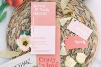 02 The wedding invitation suite was done in pink, coral and with bright letters