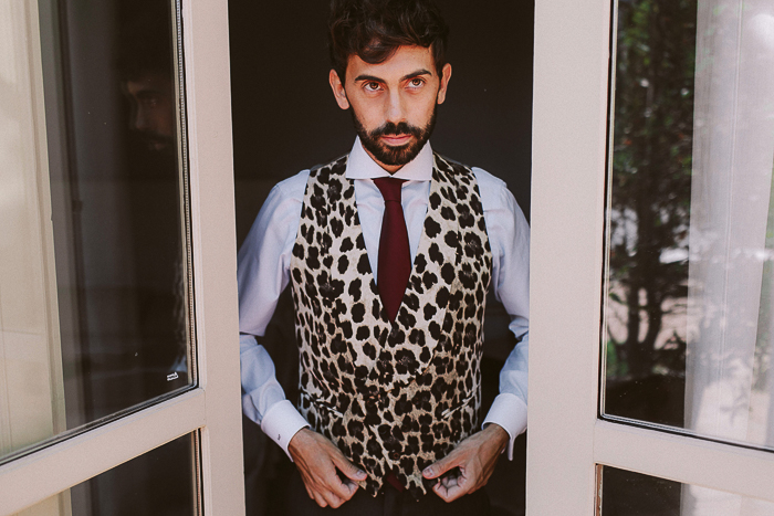 One of the grooms chose a leopard print vest to highlight his style