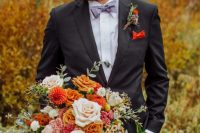 03 The groom was rocking a black suit, a lavender shirt and a lilac bow tie plus a bold boutonniere