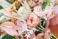 03 The wedding bouquet was very soft and tender, with blush and white blooms, greenery, pampas grass and blush ribbons