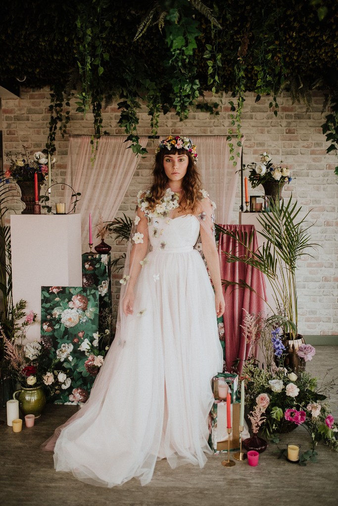 you may also see a fantastic floral headpiece and a floral coverup with white blooms