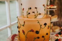 07 The wedding cake was an ombre rust one, with botanical patterns and there were macarons and tiny cupcakes