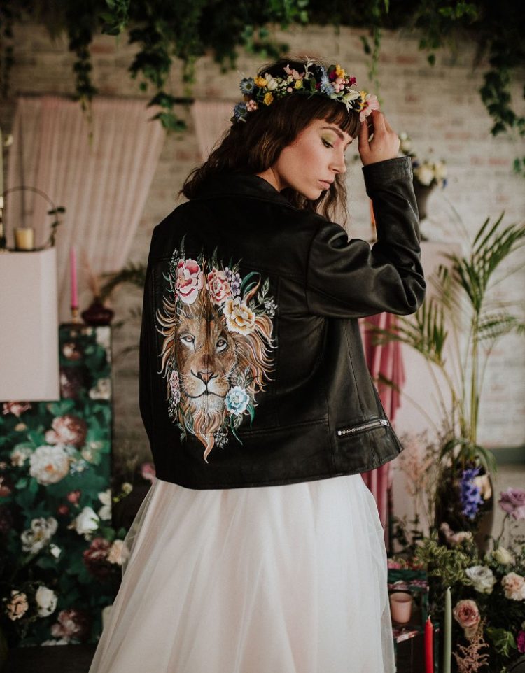 A gorgeous painted leather jacket with a lion is another idea of a coverup for a bride