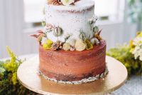 10 The wedding cake was partly naked and decorated with bright fresh and dried flowers and foliage