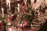 13 The wedding tablescape was refined, with greenery, pink blooms, plaid napkins and lots of candles