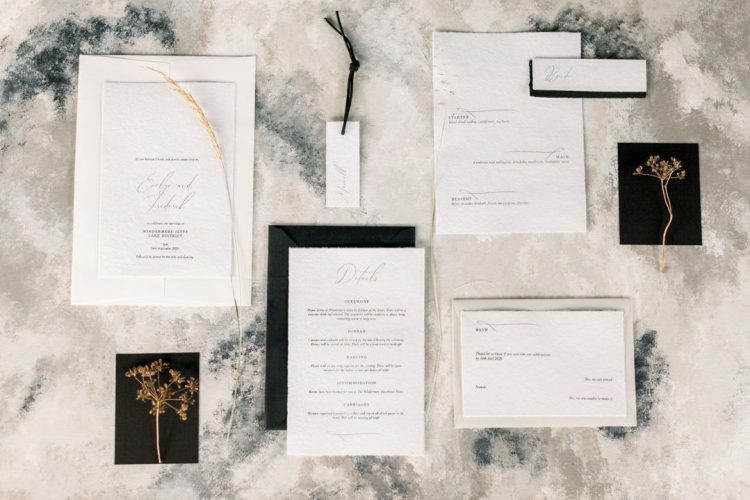 The wedding invitation suite was done in black and white, with textural paper