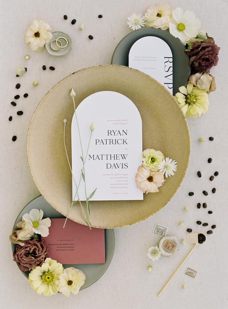 The wedding stationery was done in black, white and burgundy, with chic printing and arched touches