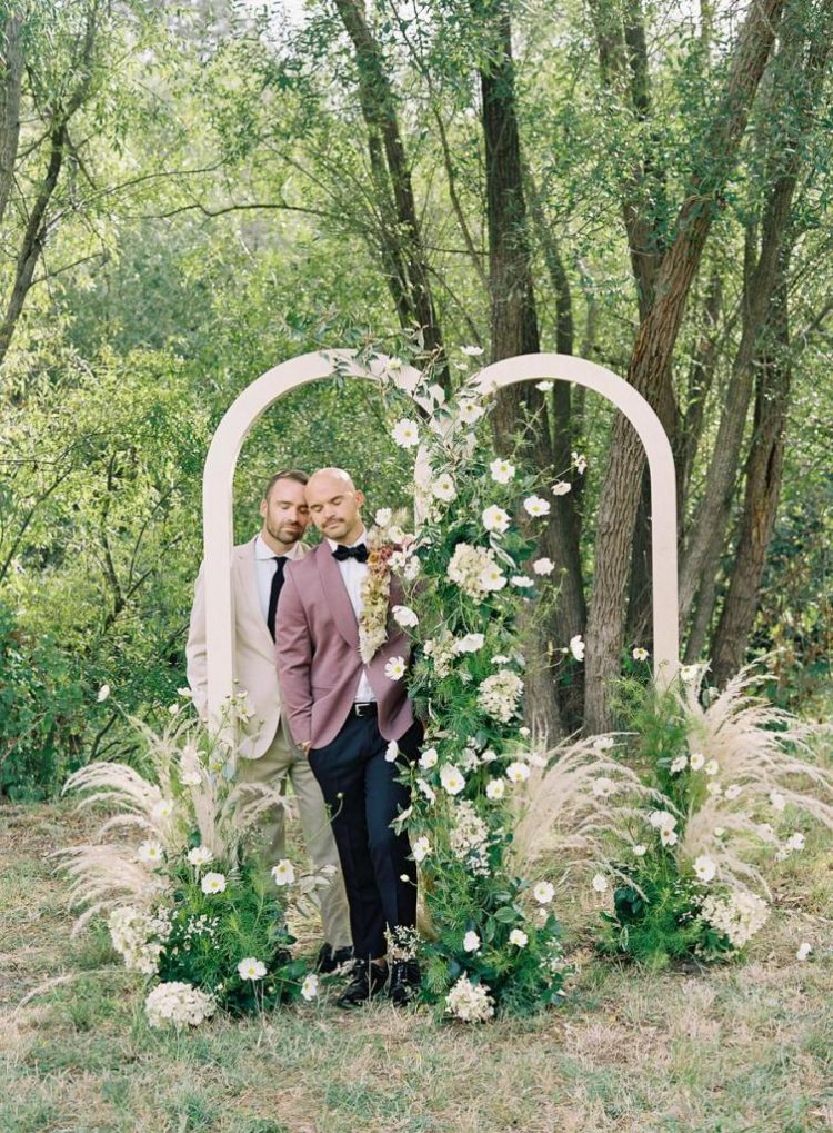 The wedding arch was a double one, with neutral blooms, greenery and pampas grass
