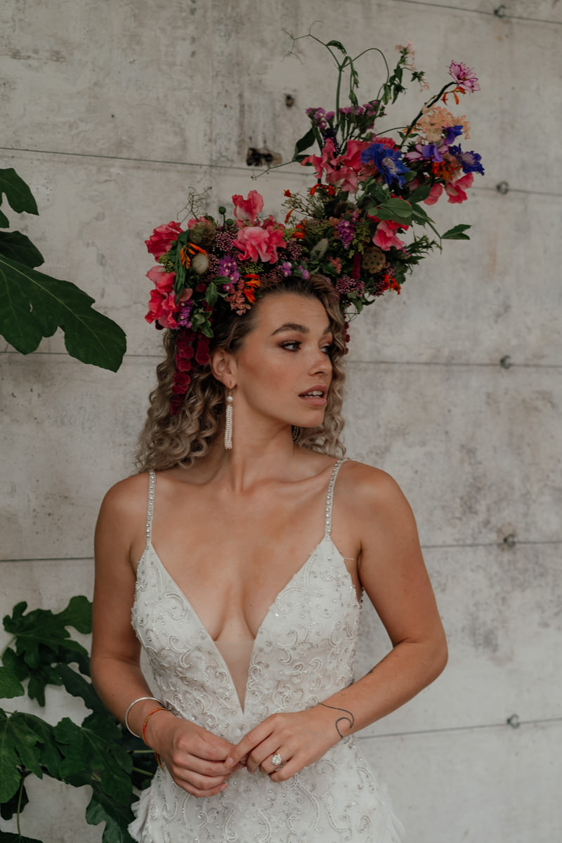 A jaw dropping fresh flower crown was created especially for the bride to match the venue decor