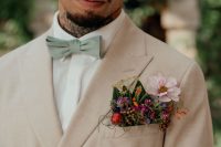 06 The groom was wearing a floral pocketsquare with greenery