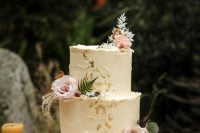 07 The wedding cake was textural, with gold foil and fresh pink blooms