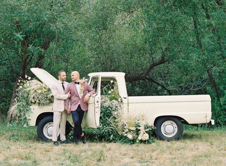 The grooms went for wedding portraits right at the truck