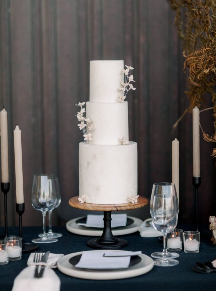 The wedding cake was a textural white one, with sugar blooms and looked very refined and beautiful