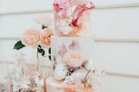 10 The wedding cake was jaw-dropping, with hand painted and decorated tiers and blooms
