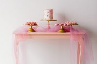 stylish pink wedding dessert table