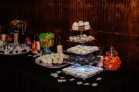10 The wedding dessert table was done with pretty clear and sheer stands, bright whimsy candies and sweets