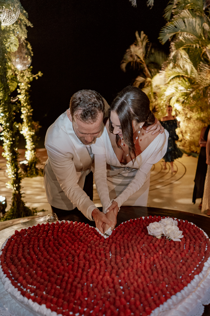 The wedding cake was a giant heart-shaped one covered with fresh berries