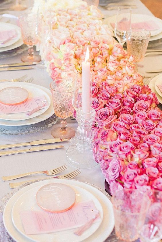 a refined ombre wedding centerpiece of white, blush and pink roses is a gorgeous decor idea for any beautiful wedding
