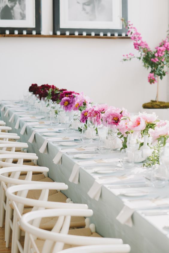 beautiful wedding table styling with ombre florals - from light pink to hot pink and burgundy is a lovely and bold idea