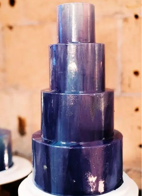 a fantastic metallic purple wedding cake with gold glitter is a gorgeous solution for a celestial wedding, it wows with its color