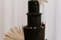 a gorgeous black wedding cake