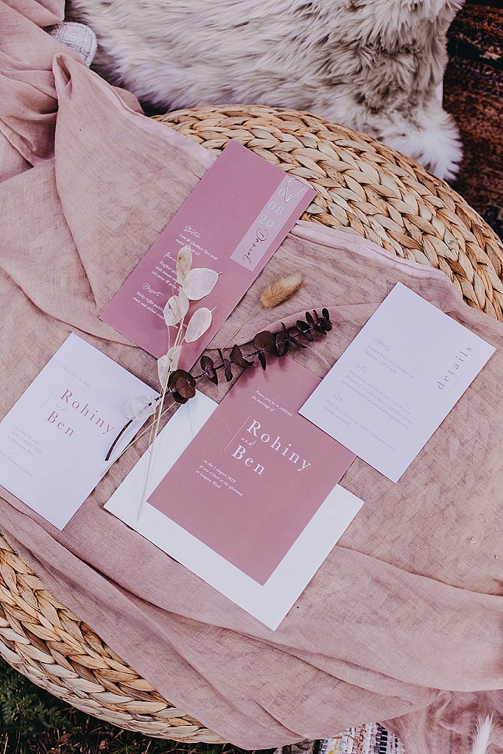 The wedding stationery was done in mauve and white, with elegant printing