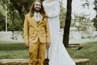 a mustard three-piece suit, a white shirt, a bolo tie, brown shoes are a great combo for a boho wedding