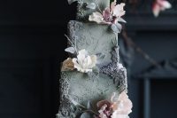 a refined grey square wedding cake with floral detailing, mauve blooms and leaves is amazing for a spring or summer wedding