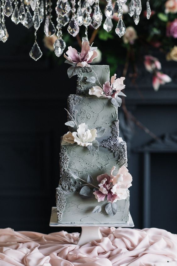 a refined grey square wedding cake with floral detailing, mauve blooms and leaves is amazing for a spring or summer wedding