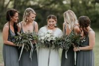 graphite grey maxi bridesmaid dresses with spaghetti straps are a great solution for a boho wedding, in summer or fall