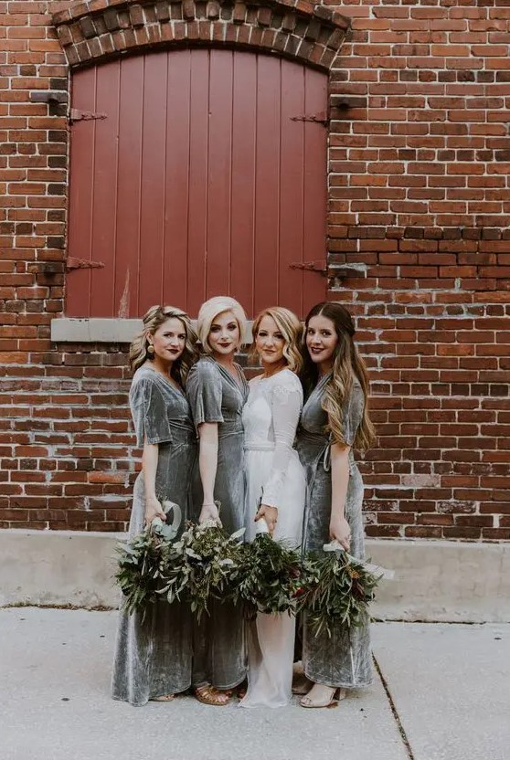 grey velvet maxi bridesmaid dresses with short sleeves and nude shoes for a chic winter wedding