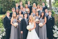 matching grey one shoulder maxi bridesmaid dresses with pleated skirts are a stylish and elegant option for a wedding