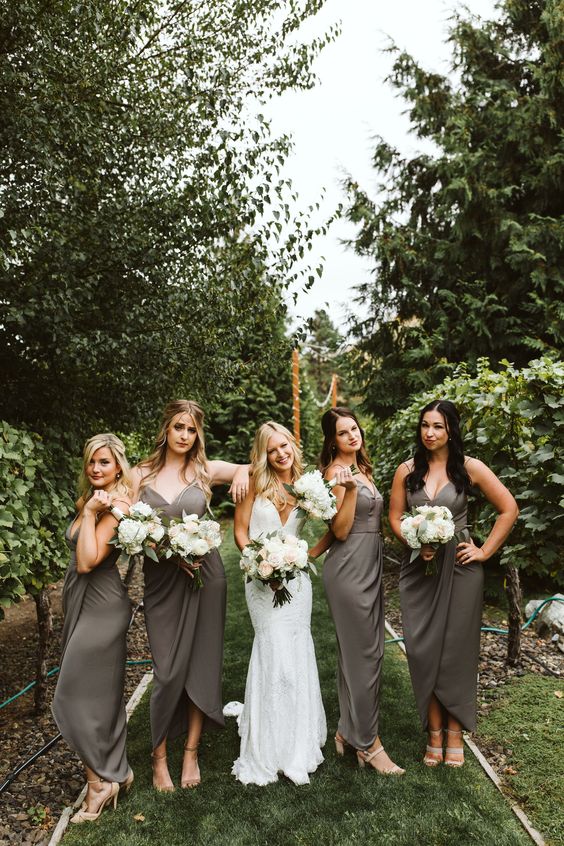 matching midi graphite grey bridesmaid dresses with sweetheart necklines, nude shoes for a spring or summer wedding