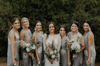 midi grey sleeveless bridesmaid dresses with white floral patterns and grey shoes are chic for a spring or summer wedding