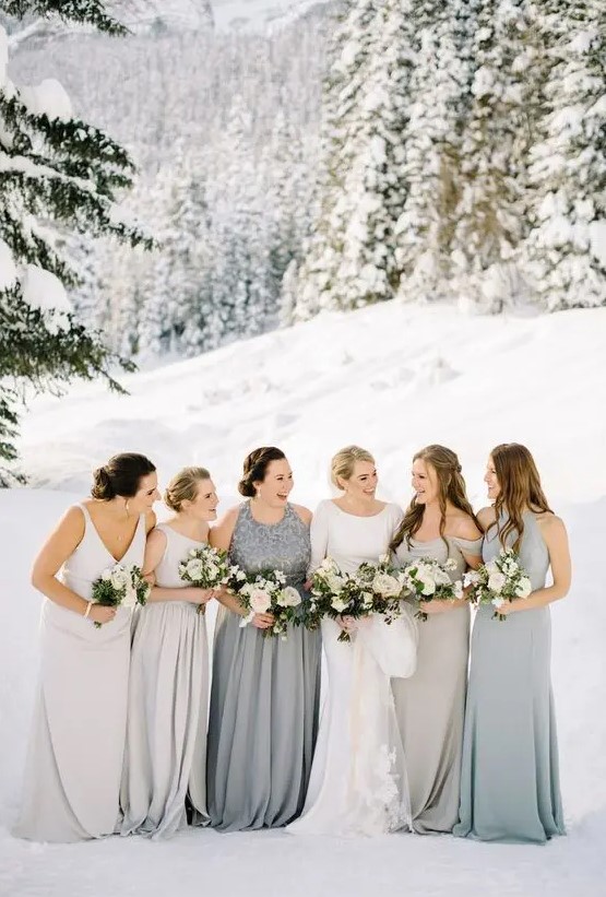 mismatching dove grey and silver grey bridesmaid gowns for an elegant and chic look