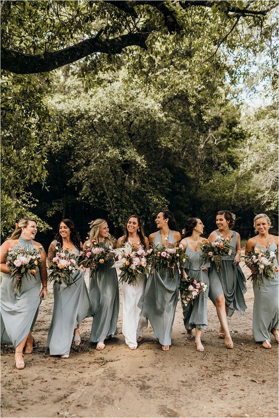 mismatching grey maxi bridesmaid dresses with various necklines and nude shoes for a chic summer or fall wedding