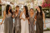 mismatching maxi bridesmaid dresses with embellishments, prints and various necklines for a chic and glam wedding