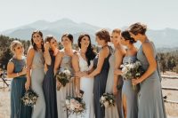 mix and match grey, blue and graphite grey maxi bridesmaid dresses with various detailing and slits for a coastal wedding