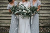 romantic grey lace fitting bridesmaid dresses with short sleeves and V-neckline for a frozen-like wedding